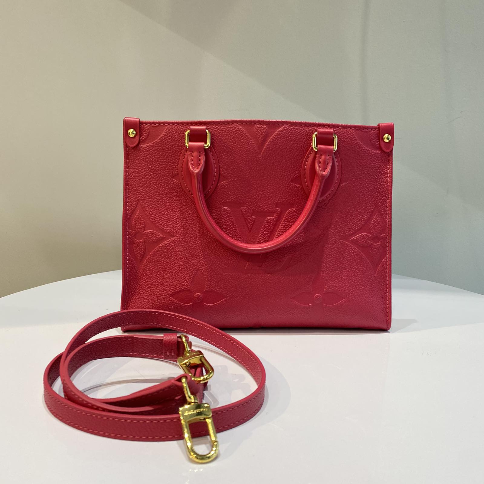 Louis VuittonEMPREINTE ON THE GO PM FREESIA RFID M45660